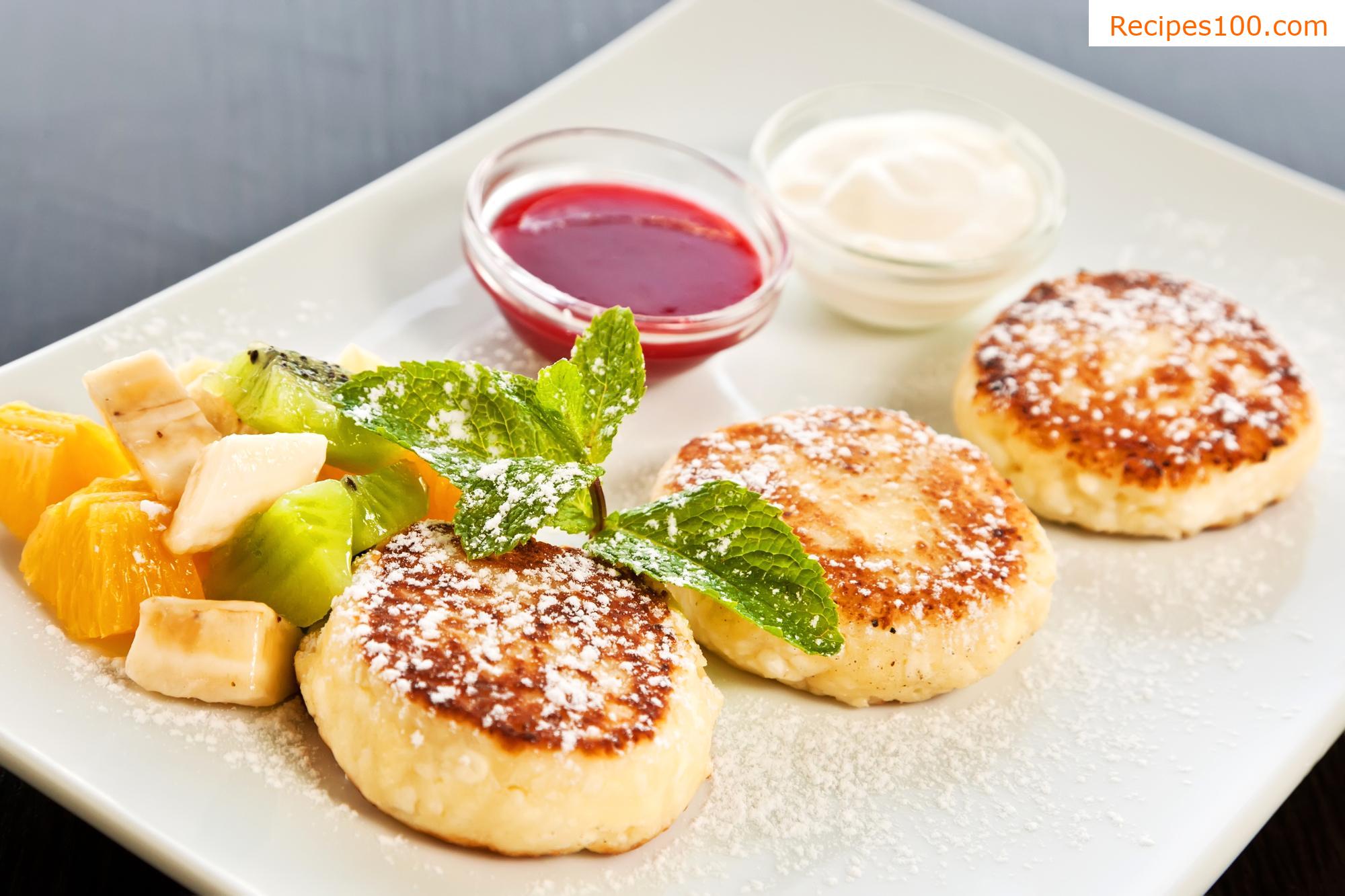 Cottage cheese pancakes with jam and yogurt