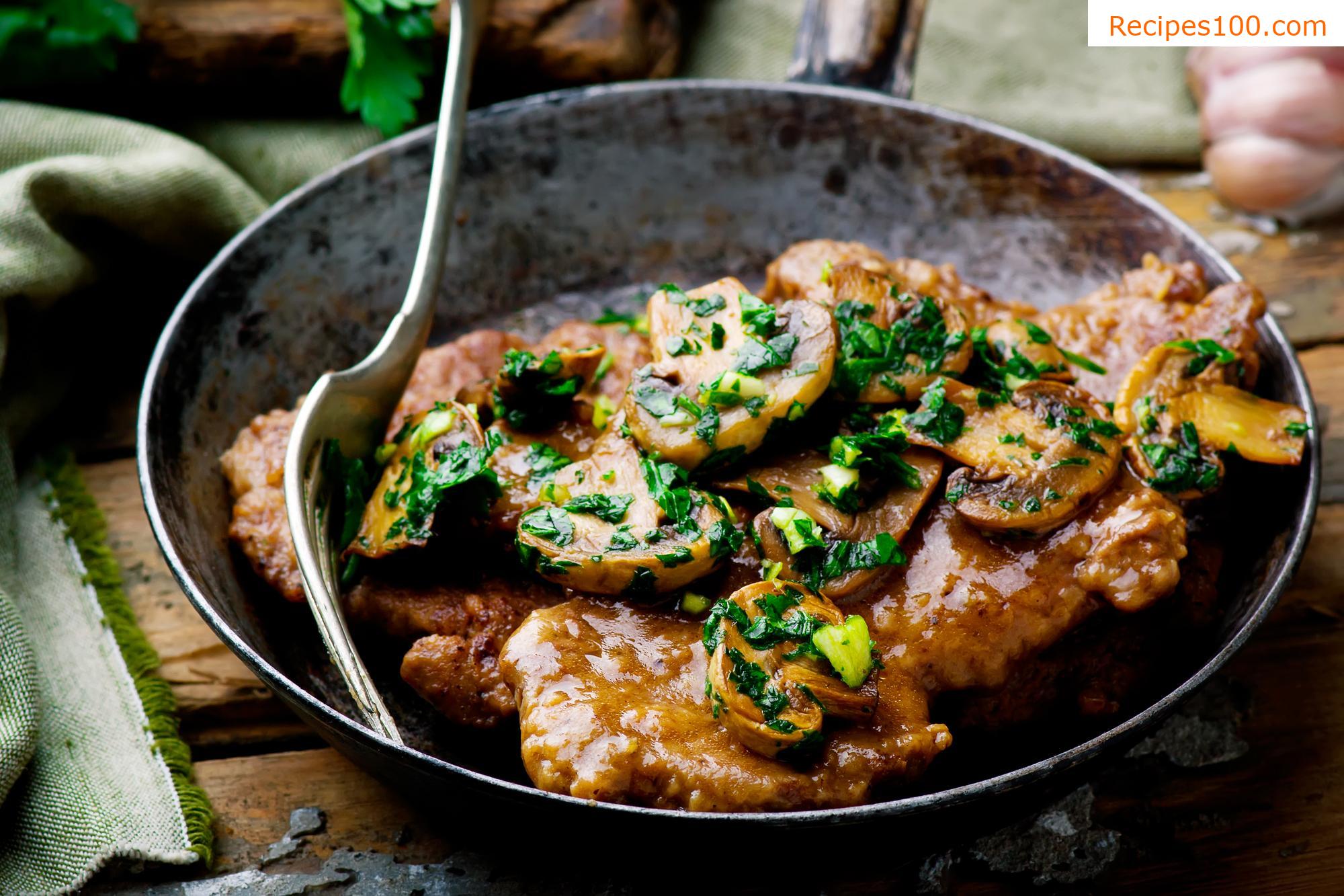 Pork chop with sausage and mushrooms