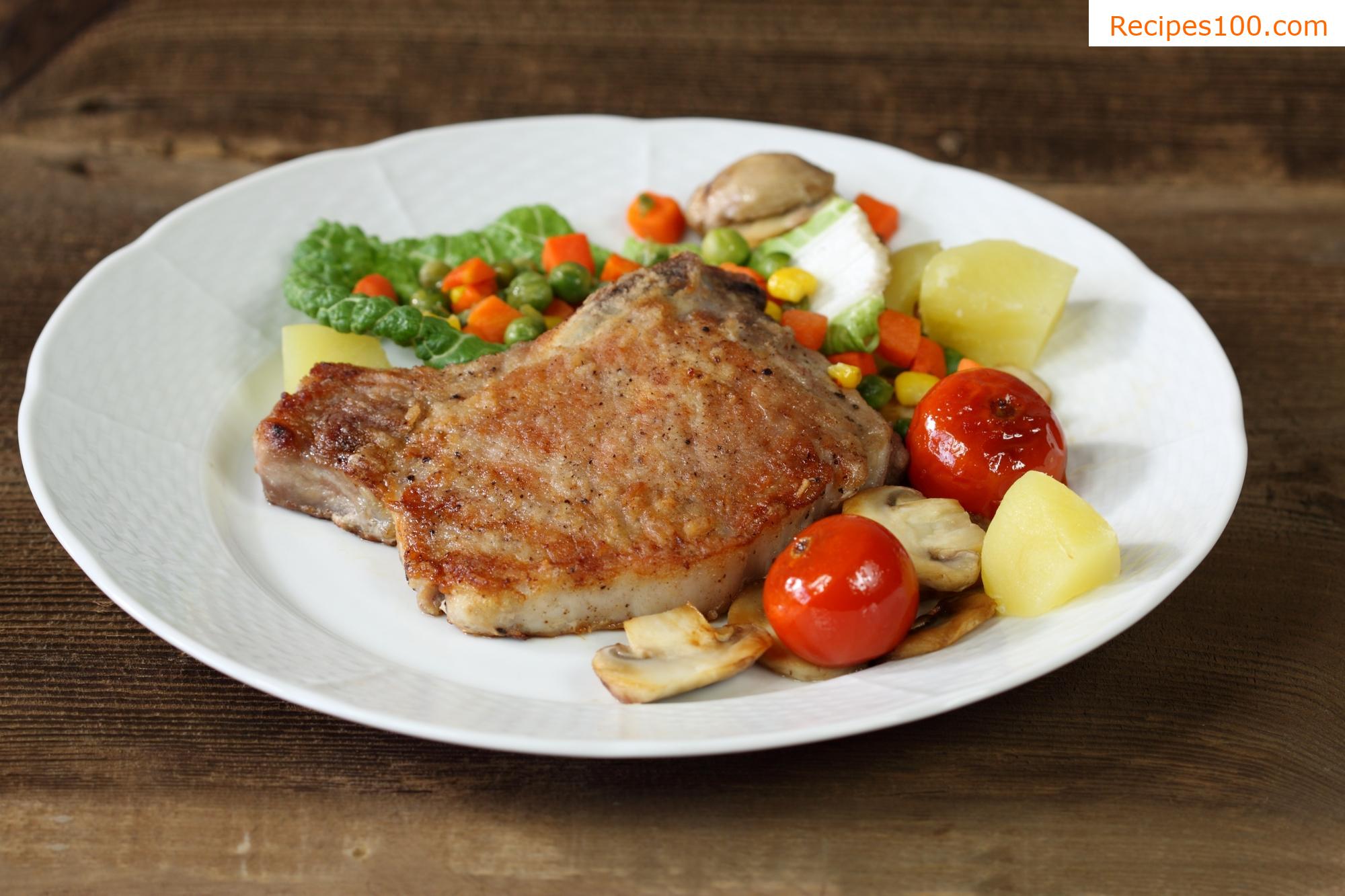 Pork chops on vegetables