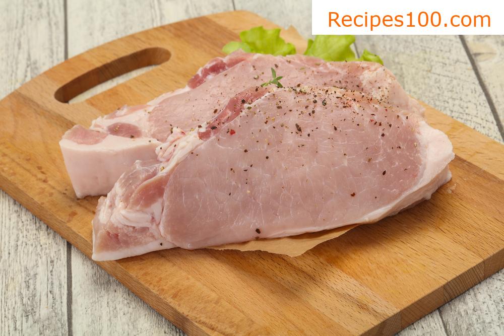 Pork slices in batter with apple puree