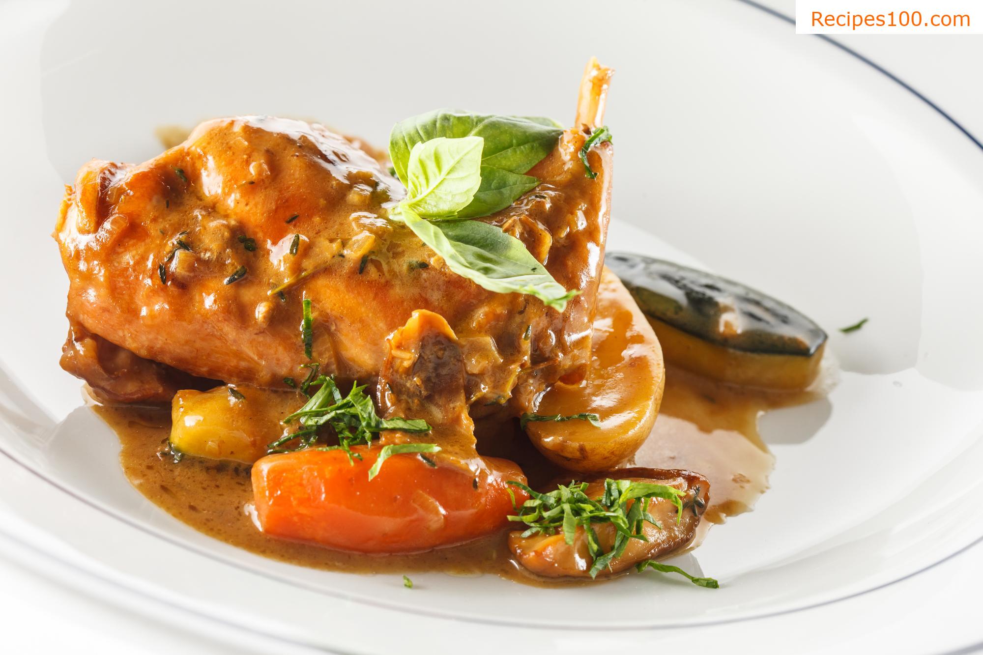 Roasted rabbit with bacon, garlic, and fresh mushrooms