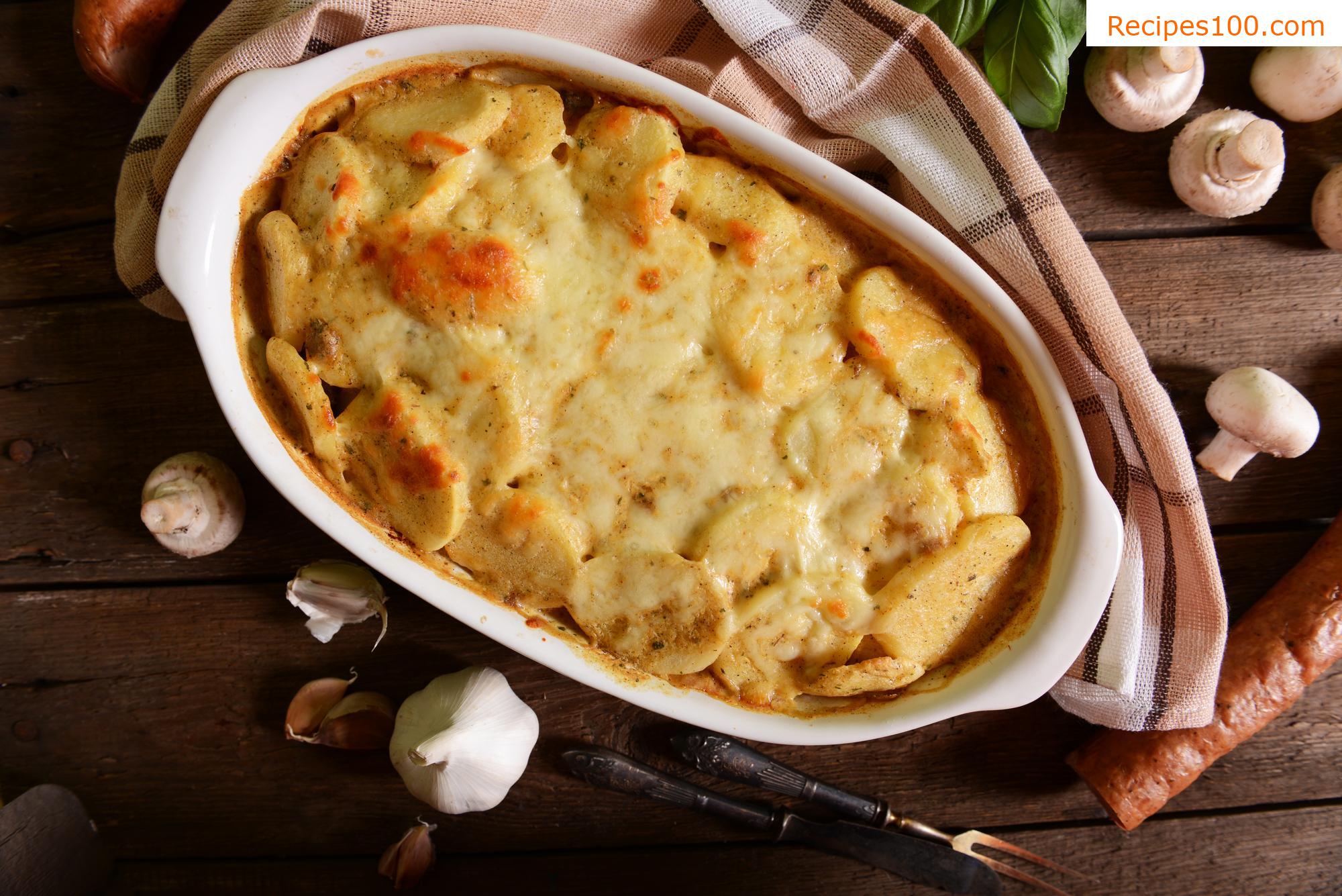 Spicy baked potatoes with cabbage, sausage, and Žirovnice - Balkan cheese