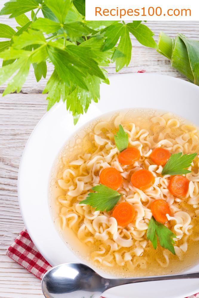 Vegetable broth with noodles or letters